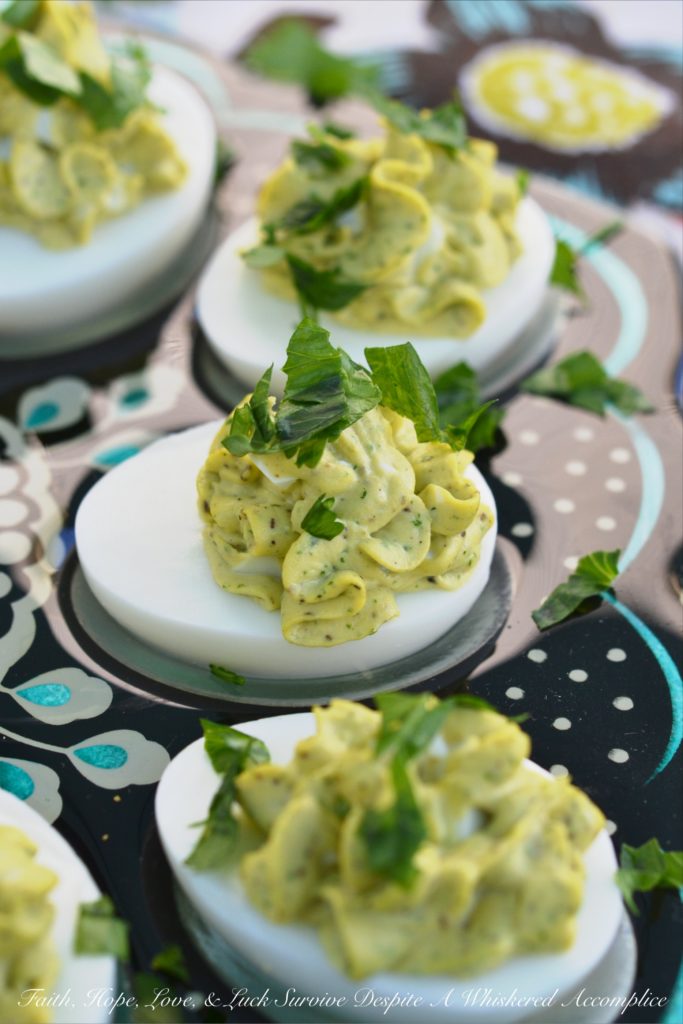 Egg Salad Deviled Eggs with Fresh Parsley - Having a hard time deciding whether or not you should make egg salad or deviled eggs? Why choose, when you can have the best of both worlds with these egg salad deviled eggs? They're super-creamy and full of delicious flavor, with a little bit of fresh parsley to brighten them up and add a lovely pop of color.