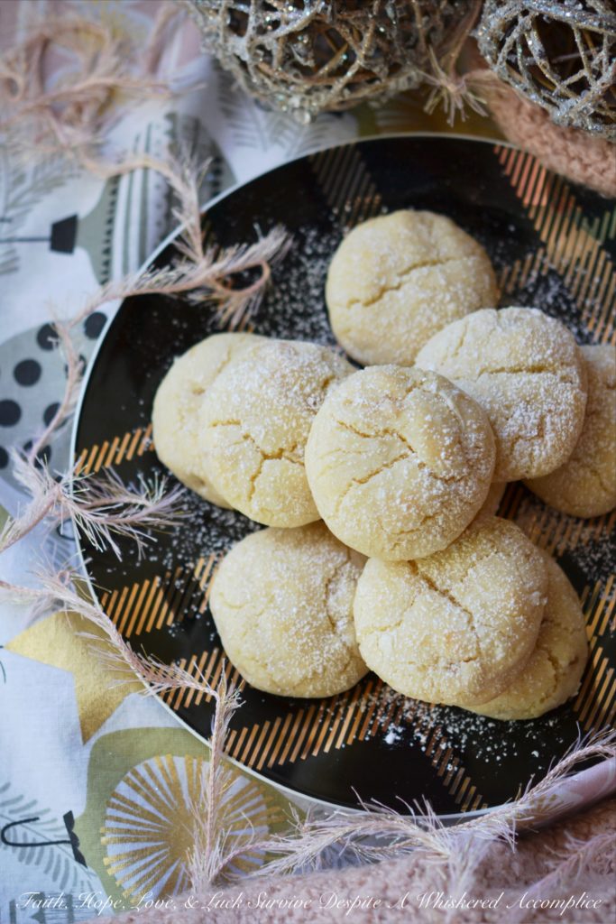 Lemon Ginger Crinkle Cookies - Lemon and ginger add a unique twist to these traditional crinkle cookies, making each bite sweet, tart, and just a little bit spicy.