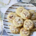 Heavenly Almond Cookies - These crumbly and buttery shortbread Christmas cookies are topped with sliced almonds and then drizzled with a heavenly eggnog-infused almond glaze.