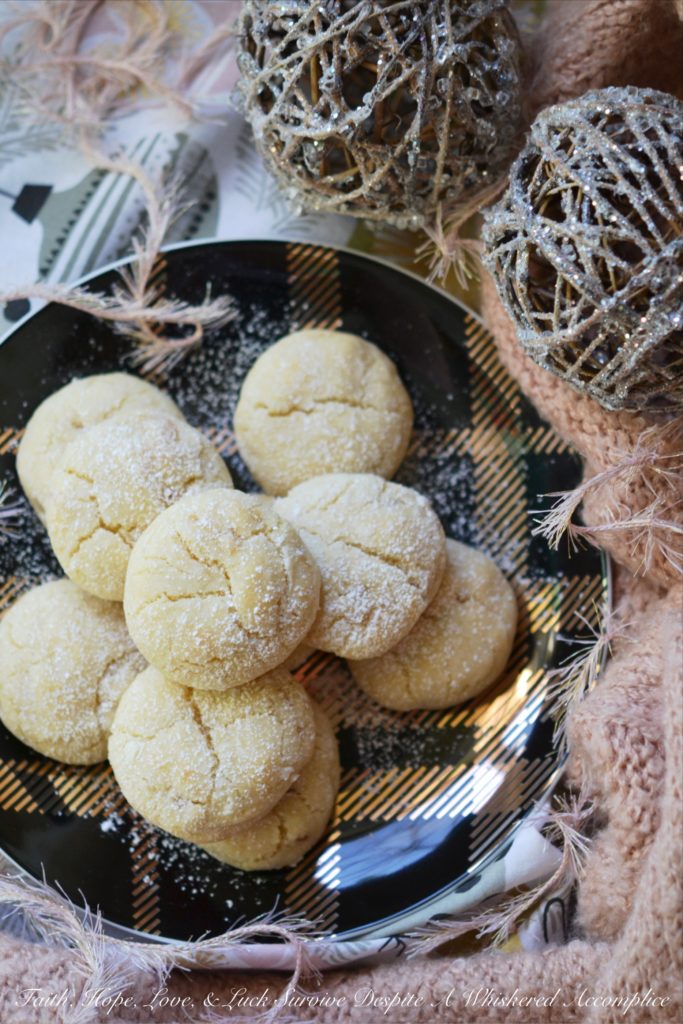 Lemon Ginger Crinkle Cookies - Lemon and ginger add a unique twist to these traditional crinkle cookies, making each bite sweet, tart, and just a little bit spicy.