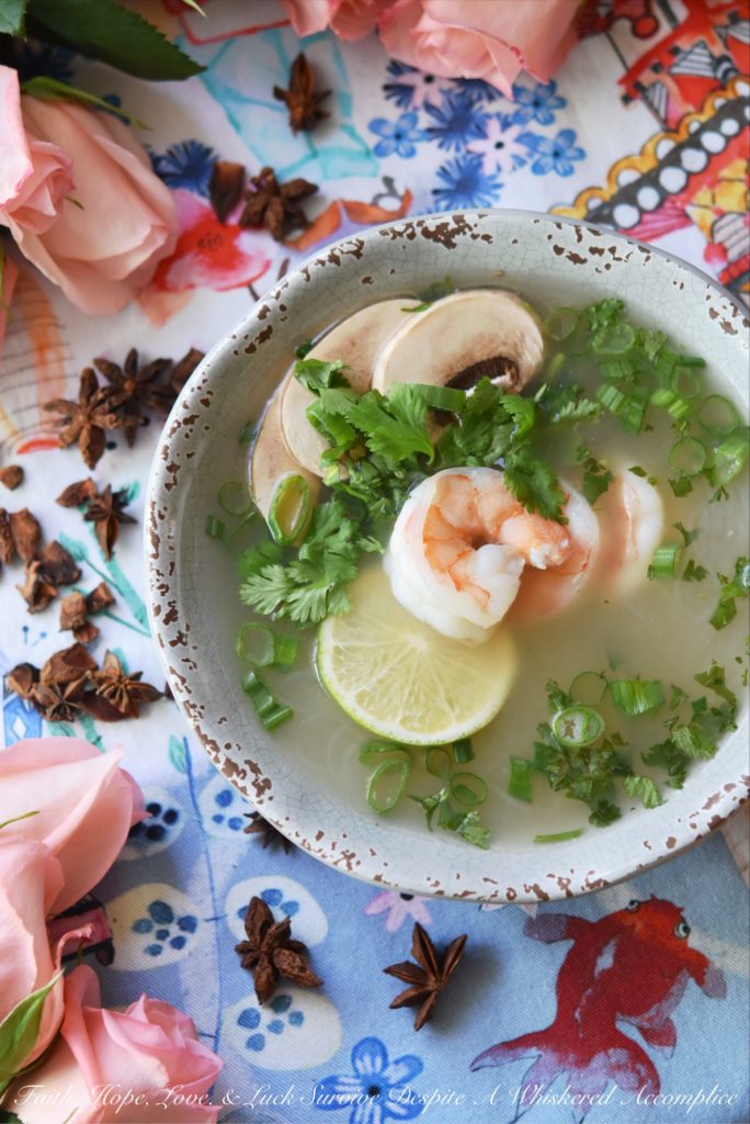 Healthy Shrimp & Rice Vermicelli Pho - Craving a warm and comforting bowl of Vietnamese pho but short on time? Delicate vermicelli noodles and succulent shrimp poach to perfection in a quick, yet deeply flavorful seasoned aromatic broth, that's both easy to make yet incredibly satisfying. Served with fresh cilantro, scallions, earthy mushrooms, and a squeeze of bright lime juice, this healthy soup is a refreshing and truly delightful guilt-free meal.