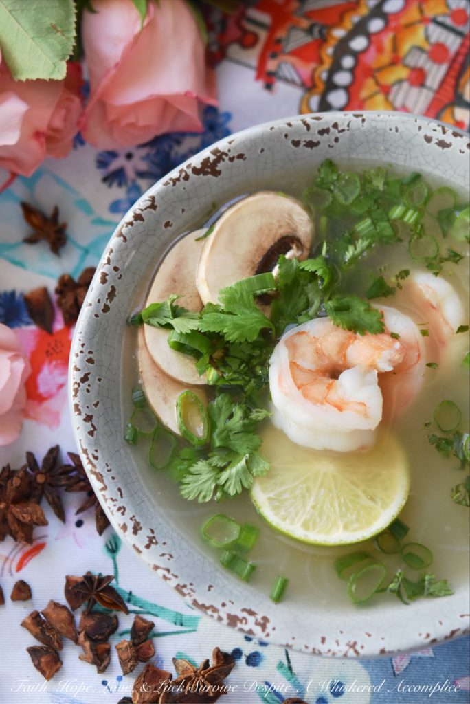 Healthy Shrimp & Rice Vermicelli Pho - Craving a warm and comforting bowl of Vietnamese pho but short on time? Delicate vermicelli noodles and succulent shrimp poach to perfection in a quick, yet deeply flavorful seasoned aromatic broth, that's both easy to make yet incredibly satisfying. Served with fresh cilantro, scallions, earthy mushrooms, and a squeeze of bright lime juice, this healthy soup is a refreshing and truly delightful guilt-free meal.