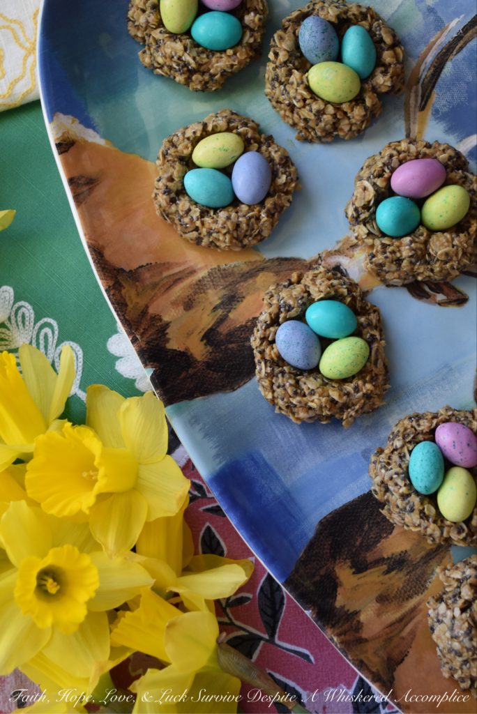 Crunchy Easter Bird Nest Granola Bites - These sweet peanut butter, oat, and chia seed bird nest granola bites are chewy and creamy with an added candy chocolate egg crunch to make them simply irresistible. This is definitely a dessert for breakfast treat you'll want to find in your Easter basket this spring.