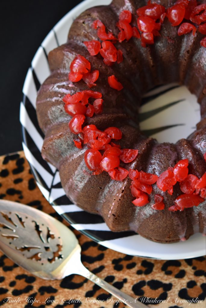 Vivid red maraschino cherries give this luscious lemon buttermilk Bundt cake a distinctive flavor, while also making it brilliantly, colorfully, and deliciously beautiful.