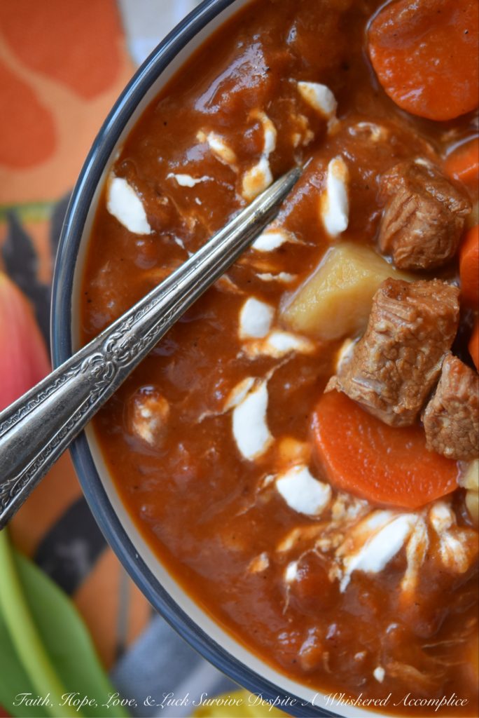 Veal Stew with Horseradish Cream Sauce - When the weather outside starts to feel like you’ve been plopped into the middle of a snow globe, it's normal to find yourself craving something warm, cozy, and just a little bit indulgent. This veal, carrot, and potato stew is a big, hearty hug in a bowl. And let’s not forget the crowning glory. A generous garnish of creamy, slightly spicy horseradish sour cream sauce swirled on top. With a bowl of this in hand, you might just start wishing winter would stick around a little longer.