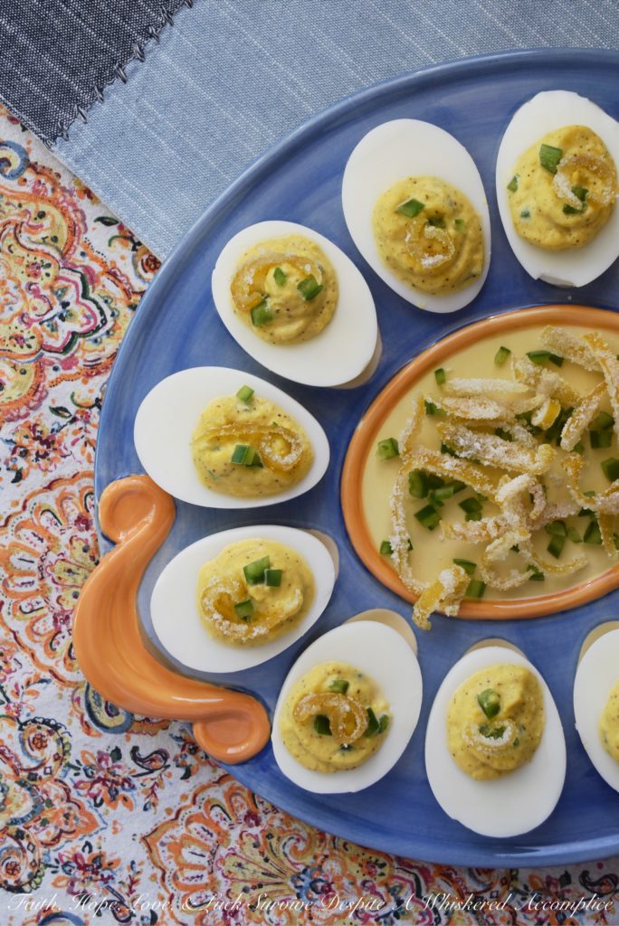Candied Lemon Zest Jalapeño Deviled Eggs - Candied lemon zest and finely chopped jalapeños turn ordinary deviled eggs into something quite extraordinary, with the addition of a touch of mayonnaise, honey, and freshly squeezed lemon juice. Add a little bit of salt and pepper, and your taste buds will simply go crazy due to absolute flavor overload.