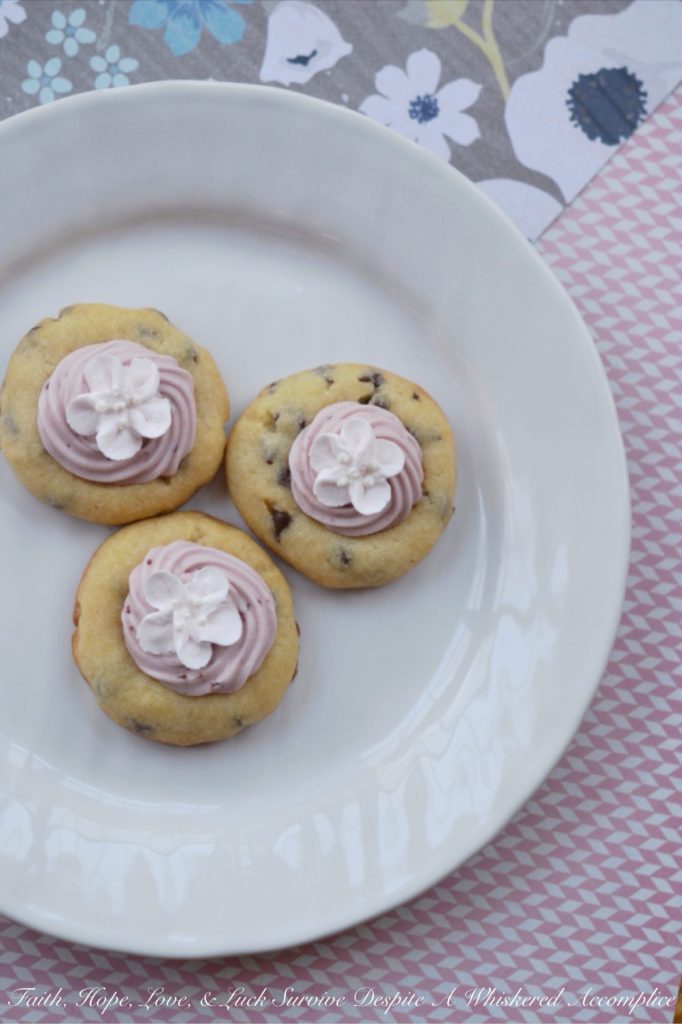 Say "Hello" to spring with these chocolate shortbread thumbprint cookies filled with cherry cream cheese frosting. Whether you decorate them with a royal icing cherry blossom flower, pink candy sprinkles, or a few chocolate shavings, I promise they'll taste just as lovely as they look.