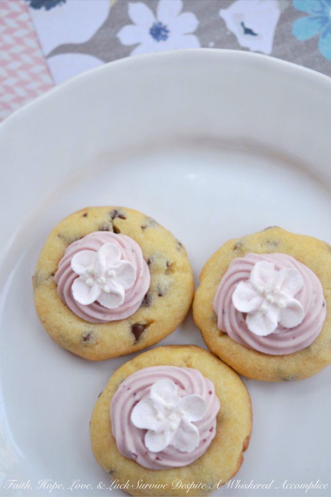 Say "Hello" to spring with these chocolate shortbread thumbprint cookies filled with cherry cream cheese frosting. Whether you decorate them with a royal icing cherry blossom flower, pink candy sprinkles, or a few chocolate shavings, I promise they'll taste just as lovely as they look.