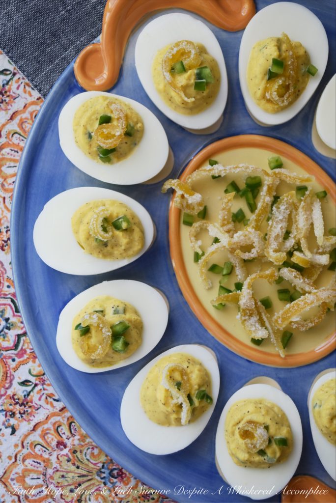 Candied Lemon Zest Jalapeño Deviled Eggs - Candied lemon zest and finely chopped jalapeños turn ordinary deviled eggs into something quite extraordinary, with the addition of a touch of mayonnaise, honey, and freshly squeezed lemon juice. Add a little bit of salt and pepper, and your taste buds will simply go crazy due to absolute flavor overload.