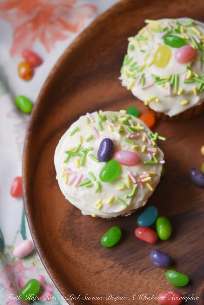 Pineapple Carrot Cake Cupcakes - Add a little something special to your Easter carrot cake cupcakes this spring with the addition of finely chopped pineapple and pineapple-infused cream cheese frosting. Not only are these cupcakes super moist, but they are also packed with flavor without being overly sweet.