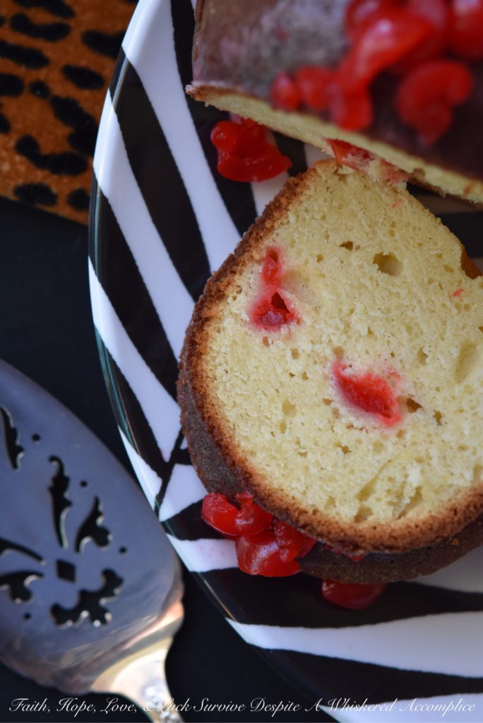 Vivid red maraschino cherries give this luscious lemon buttermilk Bundt cake a distinctive flavor, while also making it brilliantly, colorfully, and deliciously beautiful.