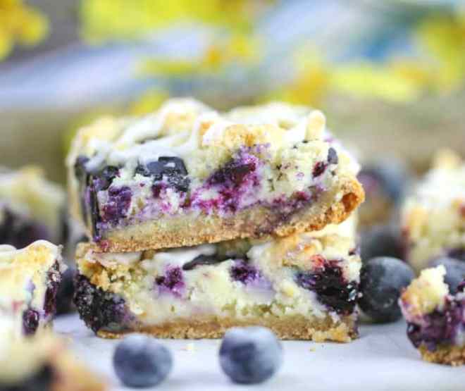 Blueberry & Cream Crumble Bars - The Baking Chocolatess - Now that the warmer weather is finally making itself known, it's time to share some "Spring Inspired Recipes." We've rounded up a few of our favorite spring-worthy favorites for this April Recipe Round-Up.