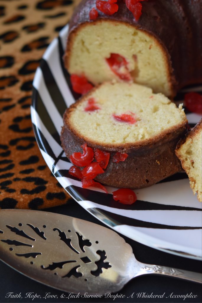 Vivid red maraschino cherries give this luscious lemon buttermilk Bundt cake a distinctive flavor, while also making it brilliantly, colorfully, and deliciously beautiful.