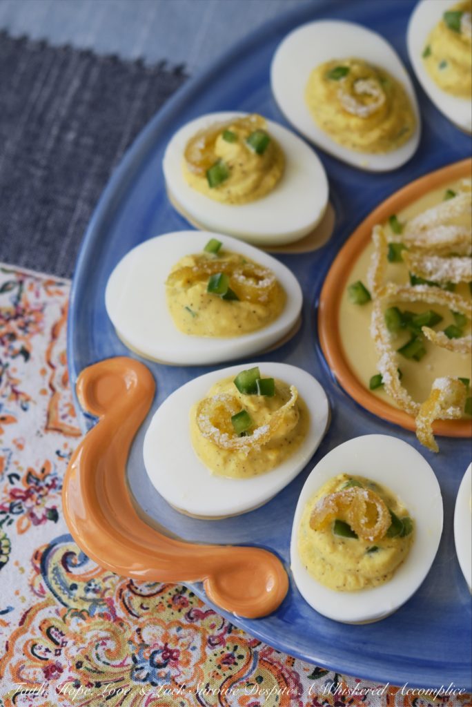 Candied Lemon Zest Jalapeño Deviled Eggs - Candied lemon zest and finely chopped jalapeños turn ordinary deviled eggs into something quite extraordinary, with the addition of a touch of mayonnaise, honey, and freshly squeezed lemon juice. Add a little bit of salt and pepper, and your taste buds will simply go crazy due to absolute flavor overload.