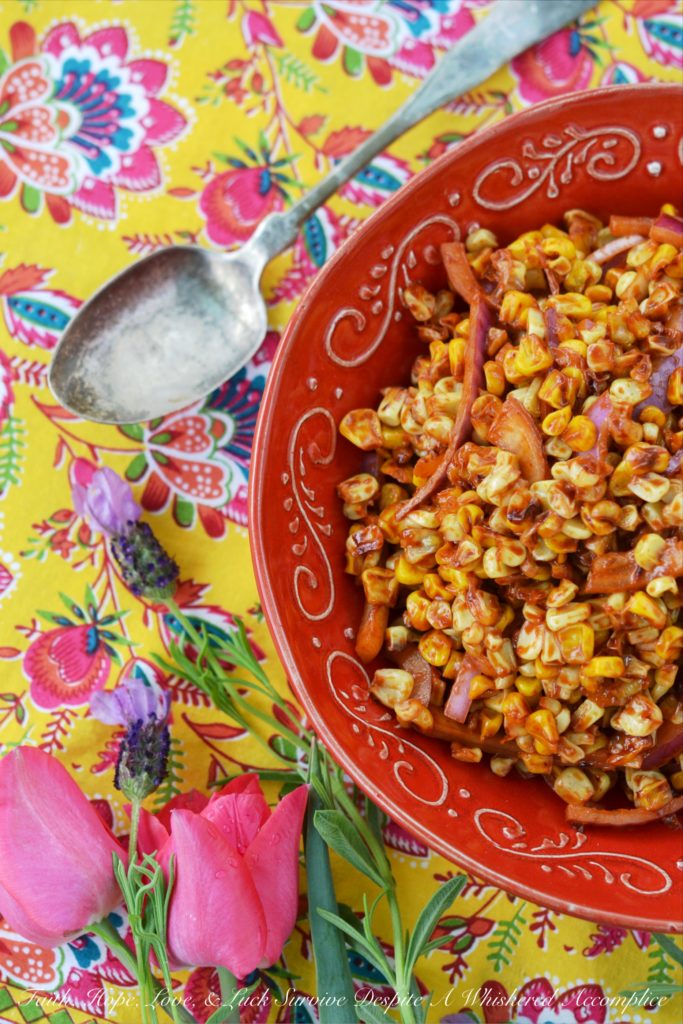 Roasted Corn Salad with Chile Vinaigrette - The perfect picnic or cookout side dish is one that is not only super flavorful but one that can hold its own against high summer temperatures. This incredible summer roasted corn salad has just the right amount of smokey chile flavor with just a touch of sweetness to help balance everything out and is also safe to serve on even the hottest summer day.