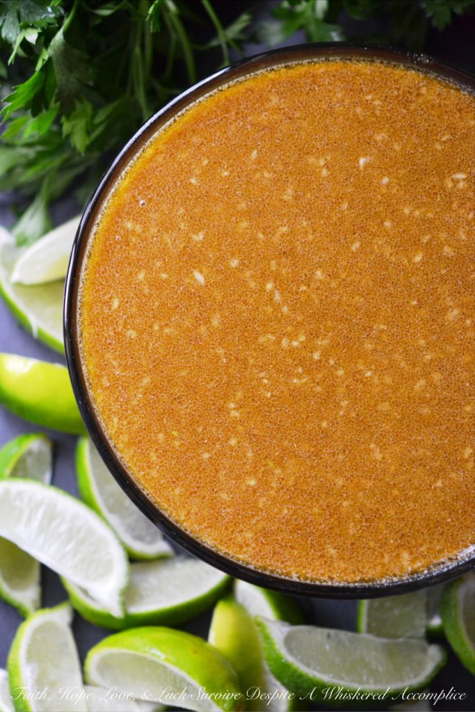 Lechon Asada Pork BBQ Sauce - Looking for a way to turn ordinary pulled pork into something extraordinary? Then this orange and lime citrus bbq sauce is definitely something you're going to want to try. It's sweet, tangy, flavorful, and gets a lovely kick from the parsley and cumin puréed into it. I promise that this lechon asada barbecue sauce is one that you're going to fall instantly in love with.