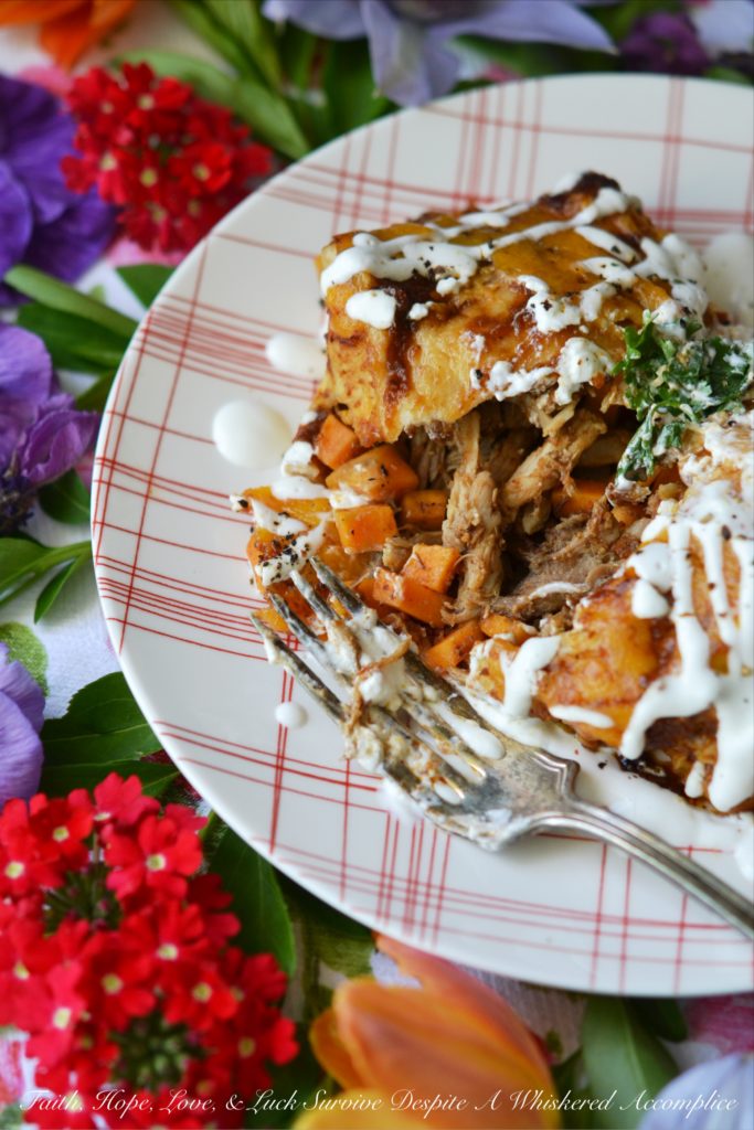 Ancho Chile Lime Pork Enchiladas | Dried ancho chile peppers and fresh lime juice make these flavorful pork enchiladas truly something special without burning off all of your taste buds. These cheddar cheese-covered enchiladas are sweet, tart, smoky, and packed with flavor. They're perfect for people who aren't crazy about spice but still want to enjoy some delicious Mexican food.