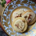 Kentucky Bourbon Pecan Chile Shortbread - A ground guajillo chile and a touch of Kentucky bourbon help to make these crumbly buttery shortbread cookies a tea-time treat you won't soon forget. And as if that weren't enough, a drizzle of vanilla bourbon glaze, a sprinkle of finely chopped pecans, and the littlest pinch of Fleur de Sel help to transform these flavorful shortbread cookies into something even more magical.