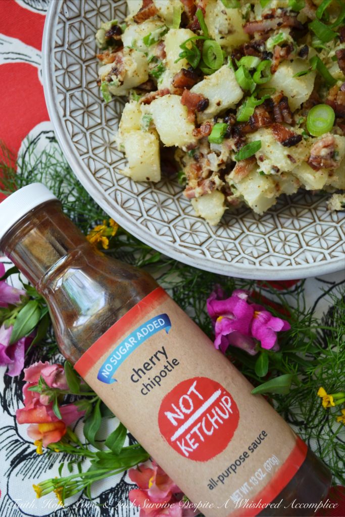 Summer BBQ Bacon Potato Salad - Say "Hello" to summertime with this simple yet super flavorful potato salad. There's a full pound of bacon folded into this summer side dish, which is first liberally brushed with barbecue sauce and then baked until browned and perfectly crispy. After you add a little bit of mayonnaise, black pepper, and finely chopped scallions, this potato salad will be ready to head to your next BBQ, picnic, or summer cookout.