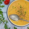 French Cream of Carrot Soup - This vibrant creamy soup recipe made using Herbes de Provence, carrots, milk, and cream is super flavorful without using a ton of ingredients. It's also a great way to turn carrots into a main dish without a lot of work involved.
