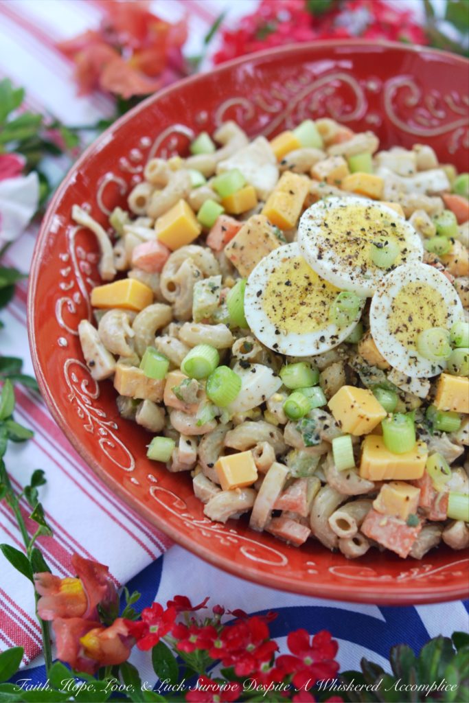 BBQ Cheddar Summer Macaroni Salad - Create a flavor-packed summer macaroni salad using barbecue sauce and cheddar cheese. Add in some finely diced vegetables, as well as some chopped hard-boiled eggs, and you've got a pasta salad worthy of any cookout, picnic, or BBQ.