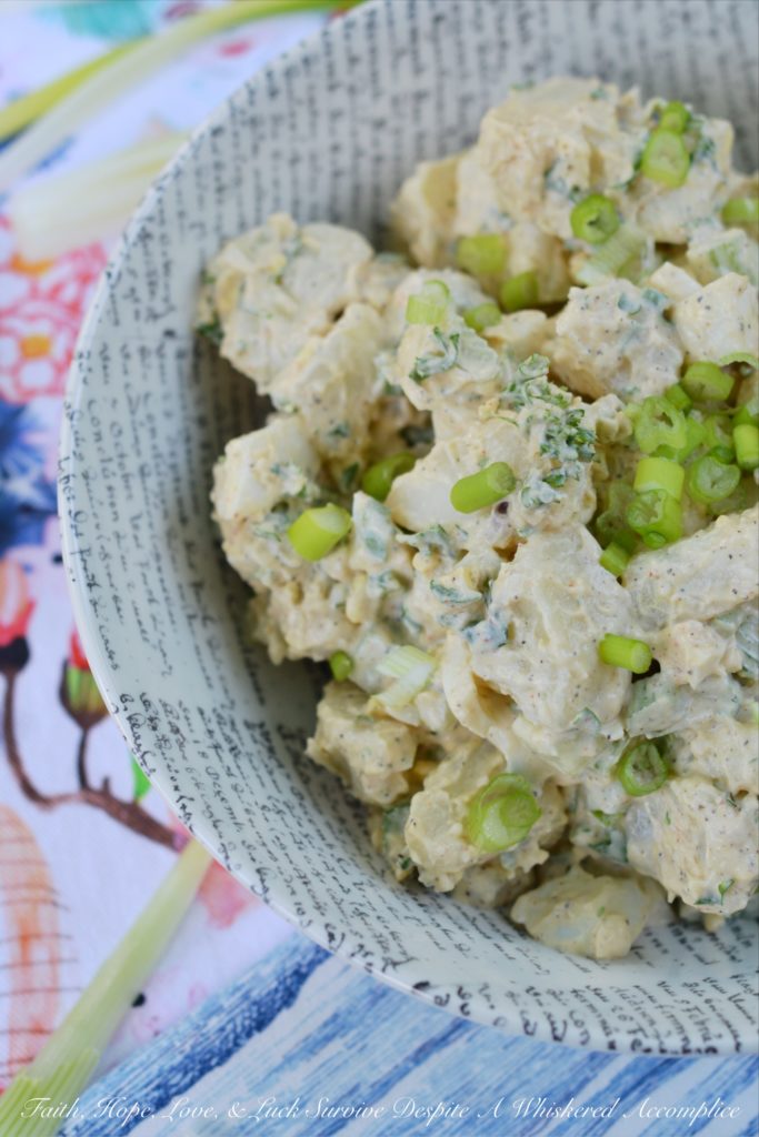 Dad's Country Garden Potato Salad - This country potato salad is made using fresh ingredients straight from the garden, along with creamy mayonnaise and a few simple ingredients. Loaded with hard-boiled eggs, finely chopped celery, fresh parsley, and chopped garden scallions or spring onions, this flavorful side salad is one that any dad would be thrilled to be served.