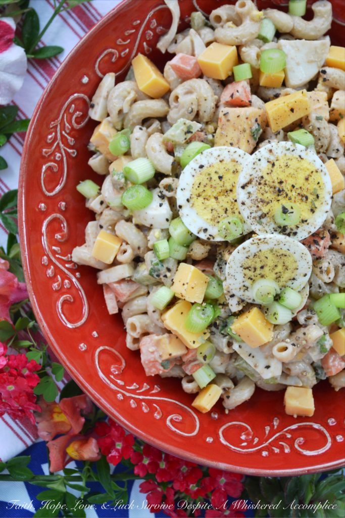 BBQ Cheddar Summer Macaroni Salad - Create a flavor-packed summer macaroni salad using barbecue sauce and cheddar cheese. Add in some finely diced vegetables, as well as some chopped hard-boiled eggs, and you've got a pasta salad worthy of any cookout, picnic, or BBQ.