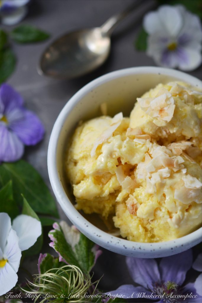 Buttery Pineapple & Coconut Frozen Custard - Looking for a sweet treat to help beat the summer heat? This frozen custard is truly a decadent warm-weather dessert thanks to the addition of toasted coconut and a swirled-in pineapple butter sauce. You'll find that this buttery ice cream has just the right amount of sweet tropical flavor to keep you coming back for more.