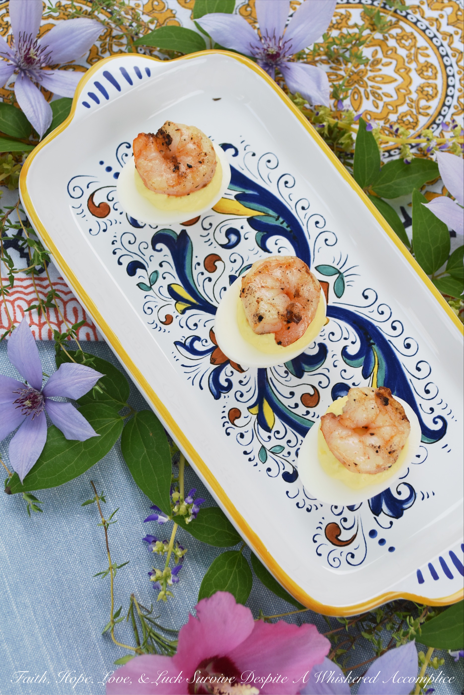 Creamy Horseradish Grilled Shrimp Deviled Eggs - Add a little zing to your next batch of deviled eggs by adding a little bit of creamy horseradish to the deviled egg filling. As an extra special treat, top each deviled egg with a shrimp which has been marinated in olive oil, salt, pepper, and paprika, and then grilled to perfection.