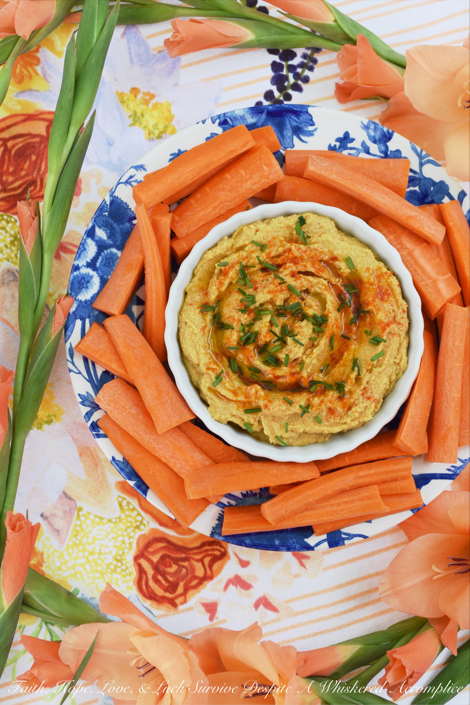 Smoky Southwestern Chickpea Hummus - Traditional chickpea or garbanzo bean hummus is given a Southwestern twist with the addition of ingredients the average person has on hand in their pantry. Smoky cumin, lime juice, lime zest, salt, black pepper, garlic powder, onion powder, paprika, ground chipotle, and extra virgin olive oil all help to give this homemade creamy hummus an amazing flavor that you'll prefer to any store-bought version.