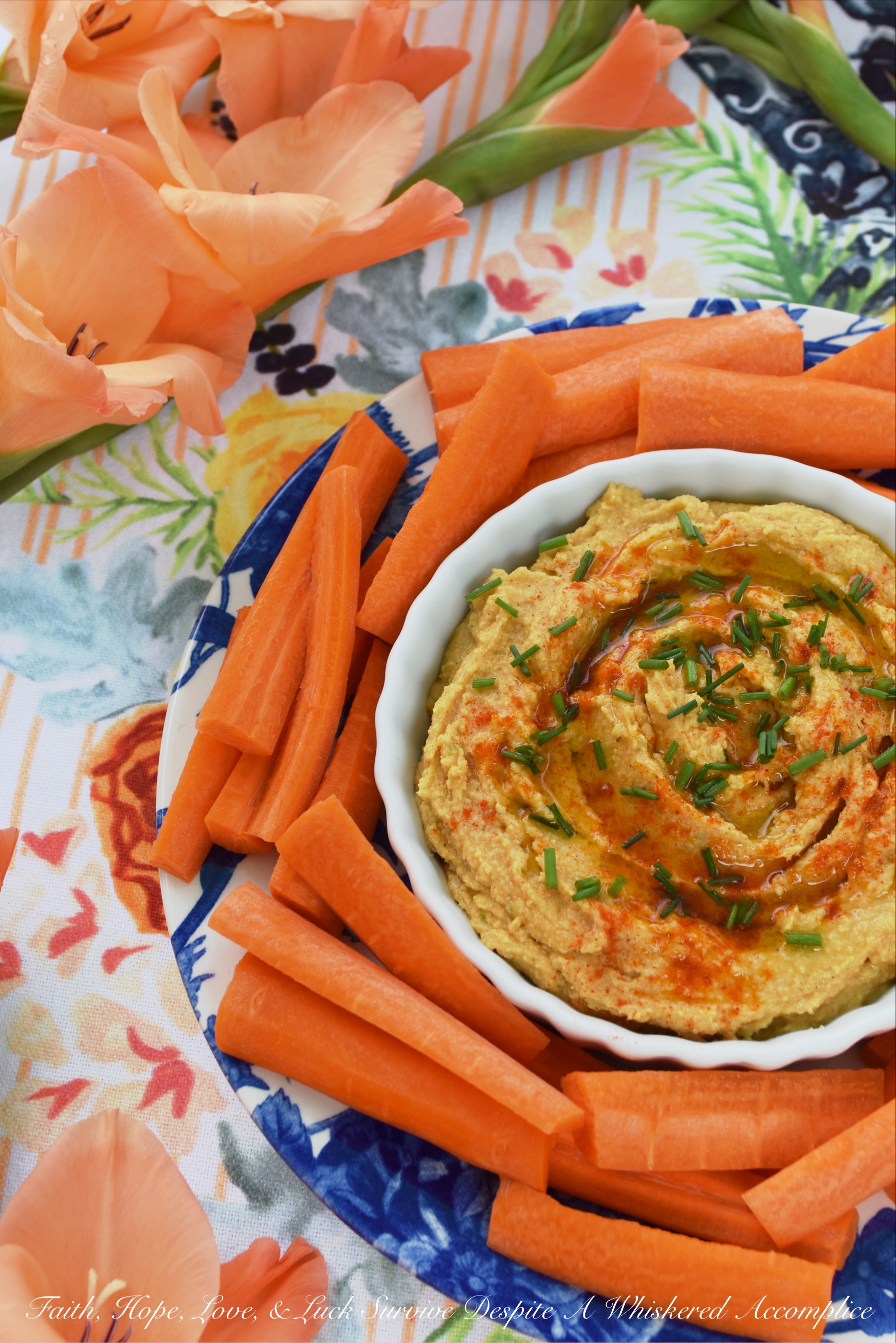 Smoky Southwestern Chickpea Hummus - Traditional chickpea or garbanzo bean hummus is given a Southwestern twist with the addition of ingredients the average person has on hand in their pantry. Smoky cumin, lime juice, lime zest, salt, black pepper, garlic powder, onion powder, paprika, ground chipotle, and extra virgin olive oil all help to give this homemade creamy hummus an amazing flavor that you'll prefer to any store-bought version.