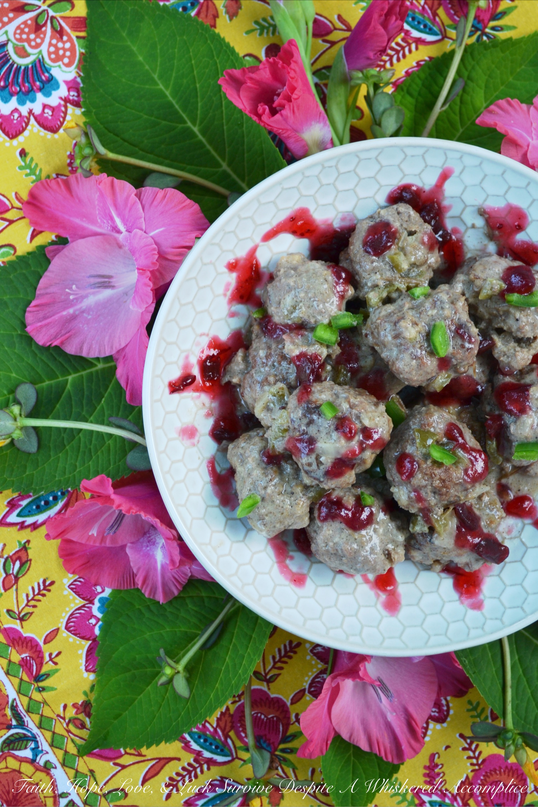 Crockpot Cranberry Jalapeño Swedish Meatballs - Swedish meatballs with a twist. These crockpot meatballs are made using homemade sweet and spicy cranberry jalapeño jam sauce that takes just minutes to make. Bake up extra meatballs to freeze, and store some extra jam sauce in the freezer, for an easy mid-week dinner or appetizer that your entire family will love.
