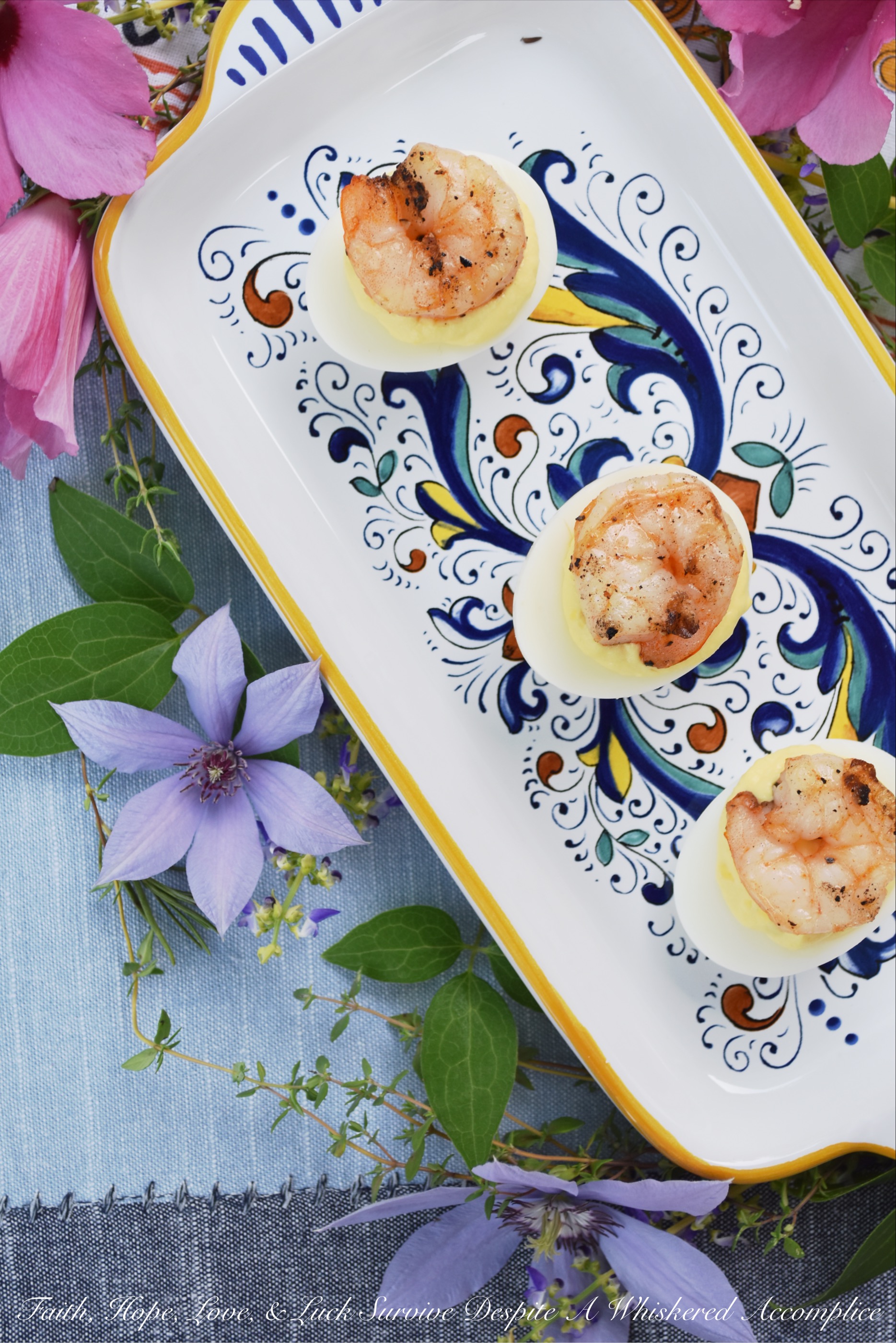 Creamy Horseradish Grilled Shrimp Deviled Eggs - Add a little zing to your next batch of deviled eggs by adding a little bit of creamy horseradish to the deviled egg filling. As an extra special treat, top each deviled egg with a shrimp which has been marinated in olive oil, salt, pepper, and paprika, and then grilled to perfection.