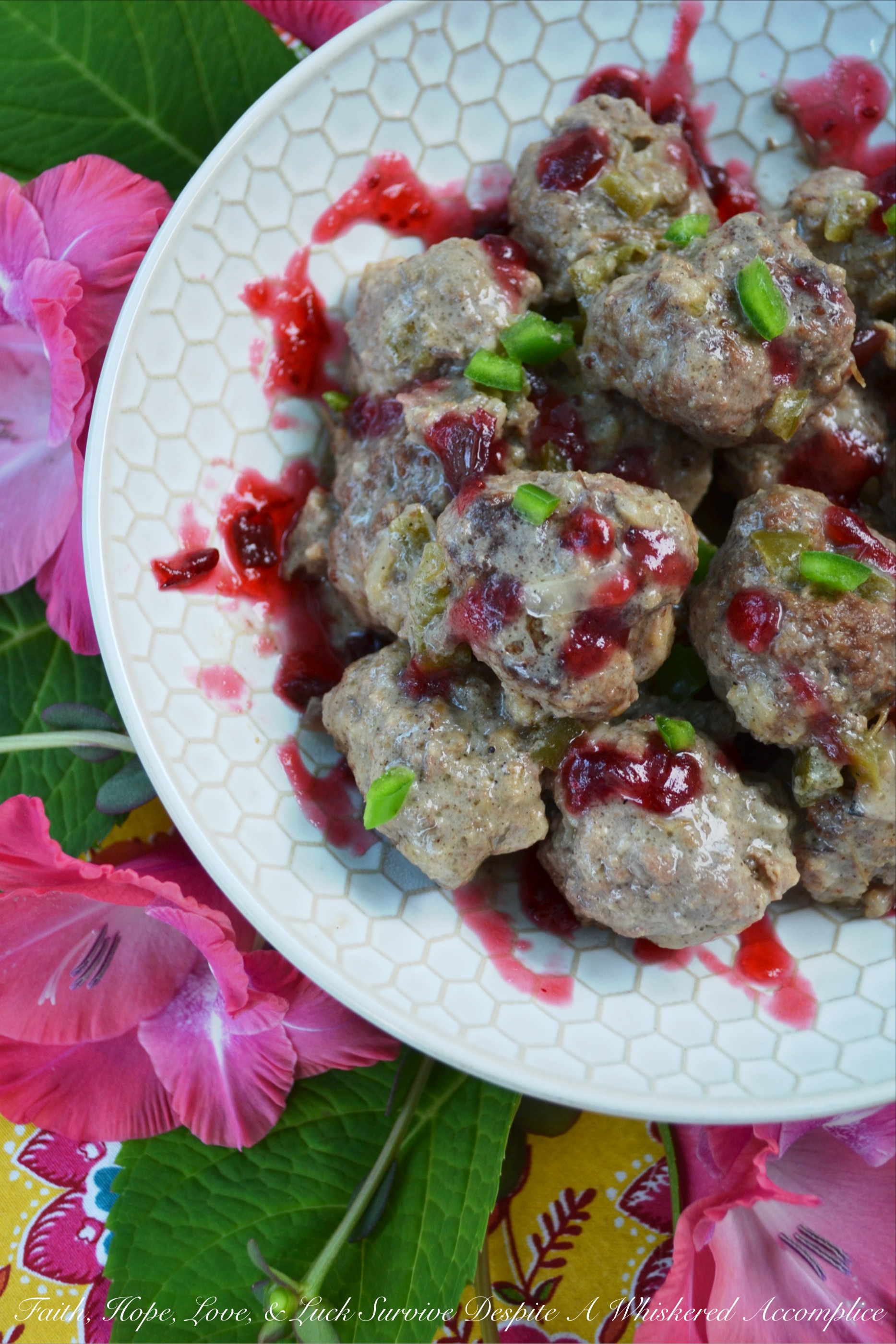 Crockpot Cranberry Jalapeño Swedish Meatballs - Swedish meatballs with a twist. These crockpot meatballs are made using homemade sweet and spicy cranberry jalapeño jam sauce that takes just minutes to make. Bake up extra meatballs to freeze, and store some extra jam sauce in the freezer, for an easy mid-week dinner or appetizer that your entire family will love.