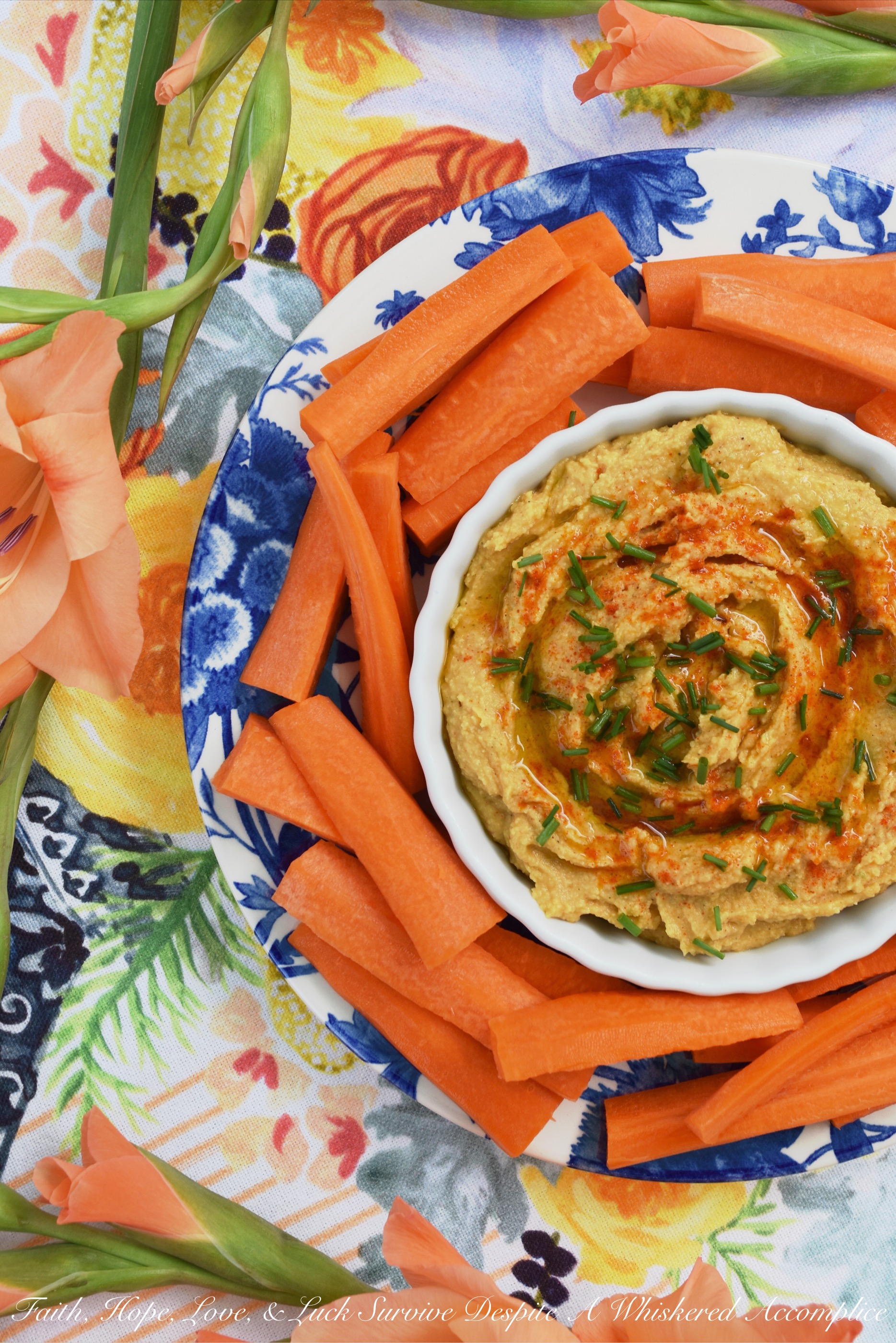 Smoky Southwestern Chickpea Hummus - Traditional chickpea or garbanzo bean hummus is given a Southwestern twist with the addition of ingredients the average person has on hand in their pantry. Smoky cumin, lime juice, lime zest, salt, black pepper, garlic powder, onion powder, paprika, ground chipotle, and extra virgin olive oil all help to give this homemade creamy hummus an amazing flavor that you'll prefer to any store-bought version.