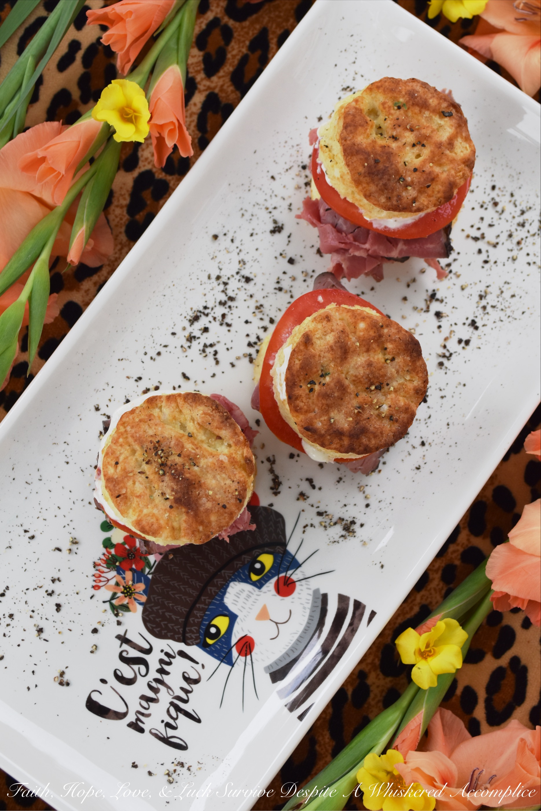 Salt & Pepper Horseradish Roast Beef Biscuits - What could be better than a roast beef sandwich? A roast beef sandwich on top of a warm homemade salt and pepper biscuit, slathered in a creamy horseradish sour cream sauce, which is then topped off with a juicy slice of ruby red tomato. Now that could possibly be the best roast beef sandwich ever.