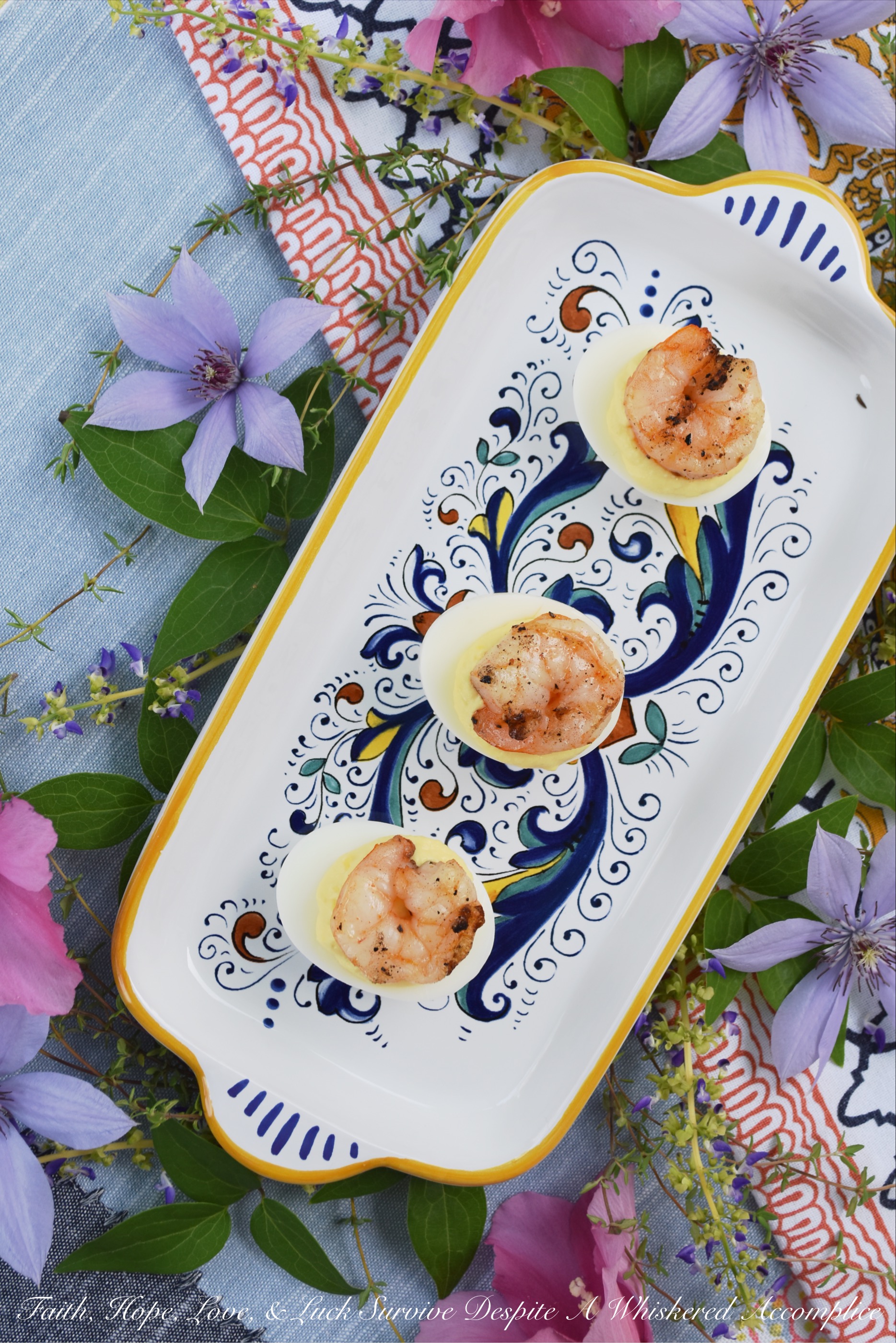 Creamy Horseradish Grilled Shrimp Deviled Eggs - Add a little zing to your next batch of deviled eggs by adding a little bit of creamy horseradish to the deviled egg filling. As an extra special treat, top each deviled egg with a shrimp which has been marinated in olive oil, salt, pepper, and paprika, and then grilled to perfection.
