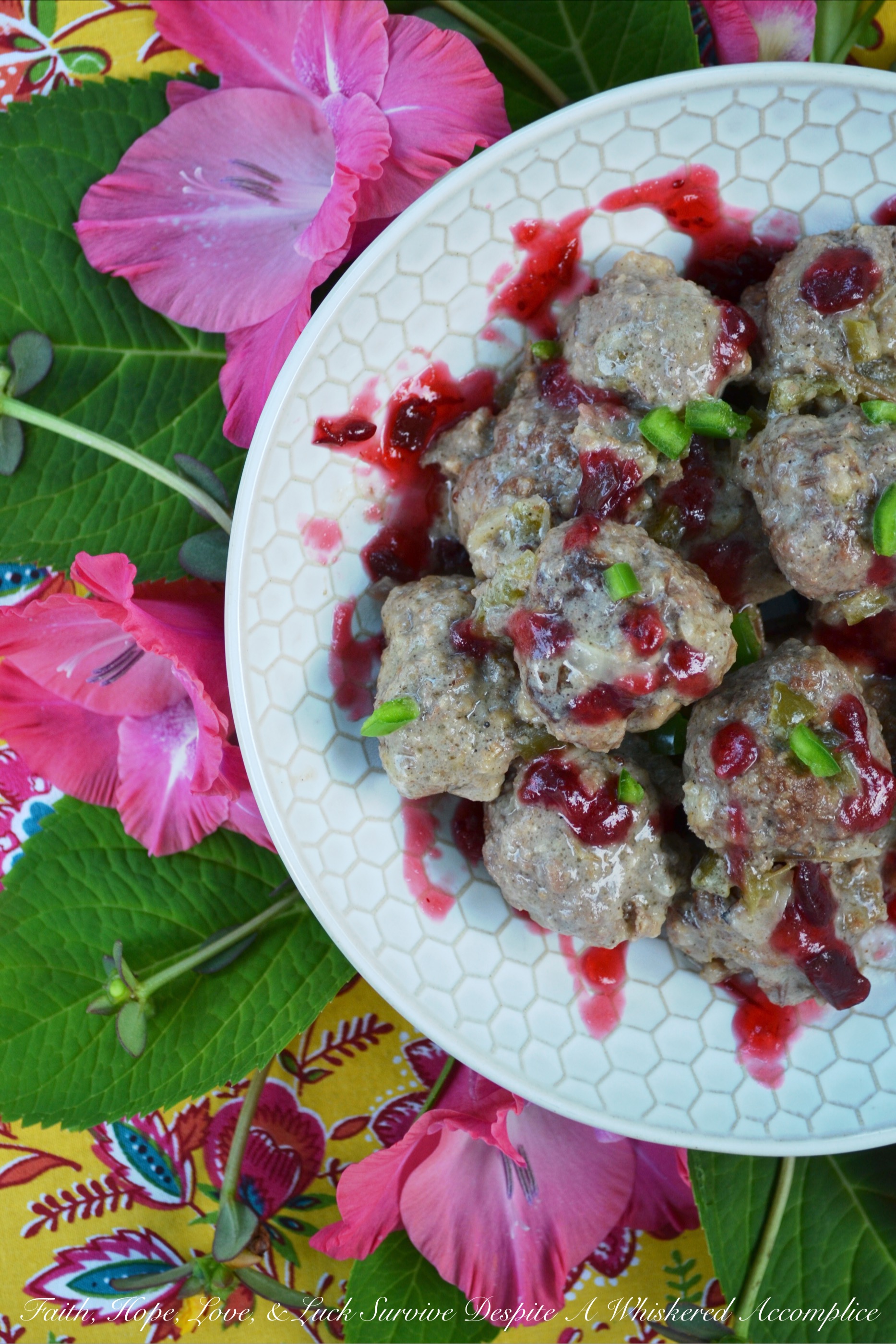 Crockpot Cranberry Jalapeño Swedish Meatballs - Swedish meatballs with a twist. These crockpot meatballs are made using homemade sweet and spicy cranberry jalapeño jam sauce that takes just minutes to make. Bake up extra meatballs to freeze, and store some extra jam sauce in the freezer, for an easy mid-week dinner or appetizer that your entire family will love.