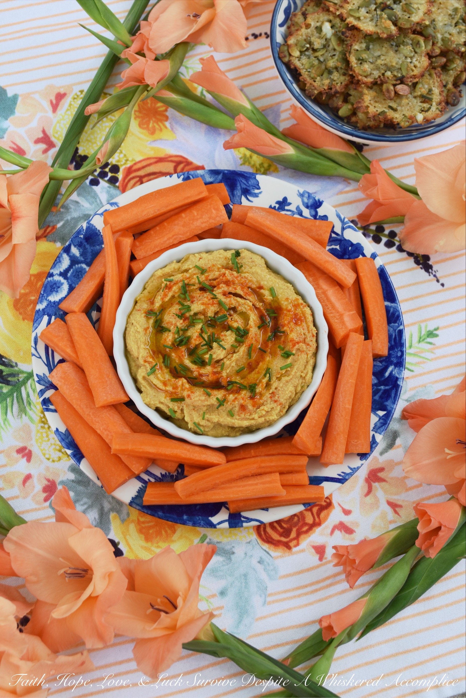 Smoky Southwestern Chickpea Hummus - Traditional chickpea or garbanzo bean hummus is given a Southwestern twist with the addition of ingredients the average person has on hand in their pantry. Smoky cumin, lime juice, lime zest, salt, black pepper, garlic powder, onion powder, paprika, ground chipotle, and extra virgin olive oil all help to give this homemade creamy hummus an amazing flavor that you'll prefer to any store-bought version.