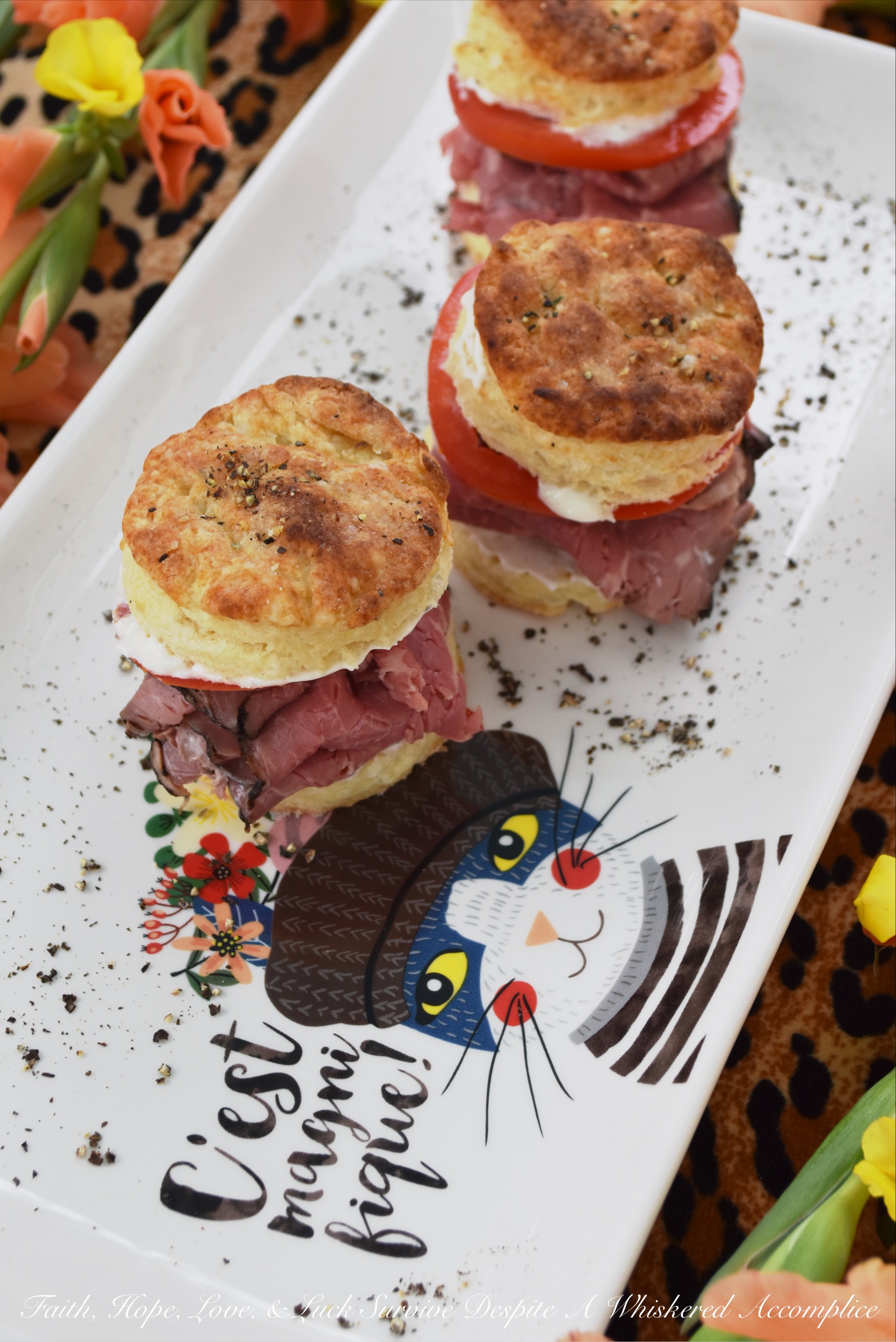 Salt & Pepper Horseradish Roast Beef Biscuits - What could be better than a roast beef sandwich? A roast beef sandwich on top of a warm homemade salt and pepper biscuit, slathered in a creamy horseradish sour cream sauce, which is then topped off with a juicy slice of ruby red tomato. Now that could possibly be the best roast beef sandwich ever.