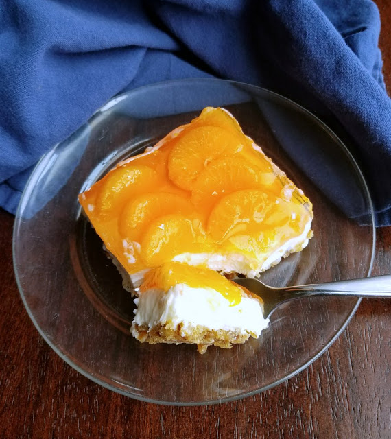 Orange Creamsicle Pretzel Salad - Cooking with Carlee - Welcome to the Friday Frenzy, the best food and craft link party on the web. Visit us this week to see what recipes and crafts we are most excited about.