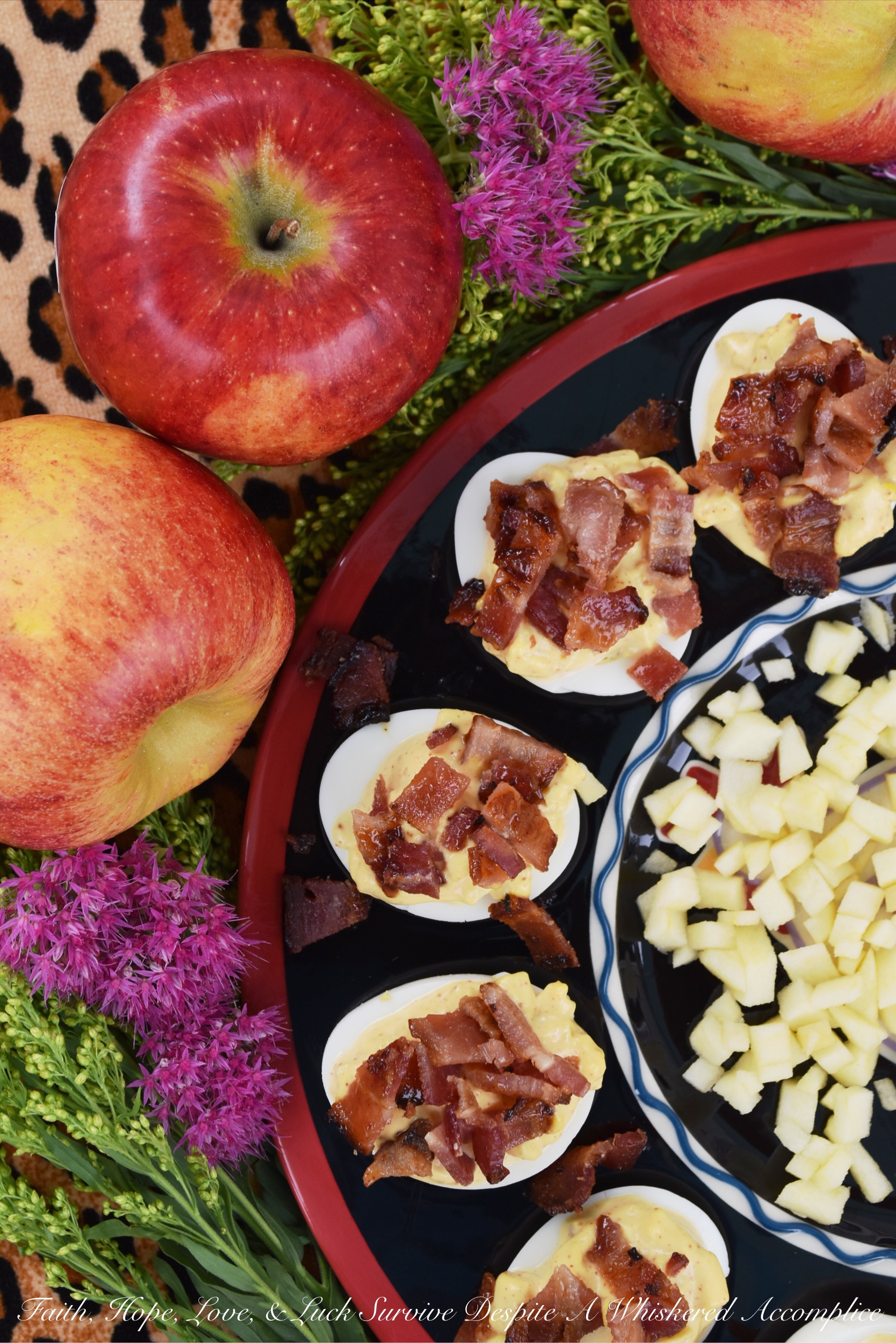 Apple & Chipotle Candied Bacon Deviled Eggs - Apples and deviled eggs certainly aren't an everyday combination, however, in this fall apple appetizer recipe, they truly do work deliciously well with one another. Perhaps it's the chipotle candied bacon which helps bring them together for the perfect marriage. I'm not sure. All I know is that once I start eating them, I seriously can't stop.