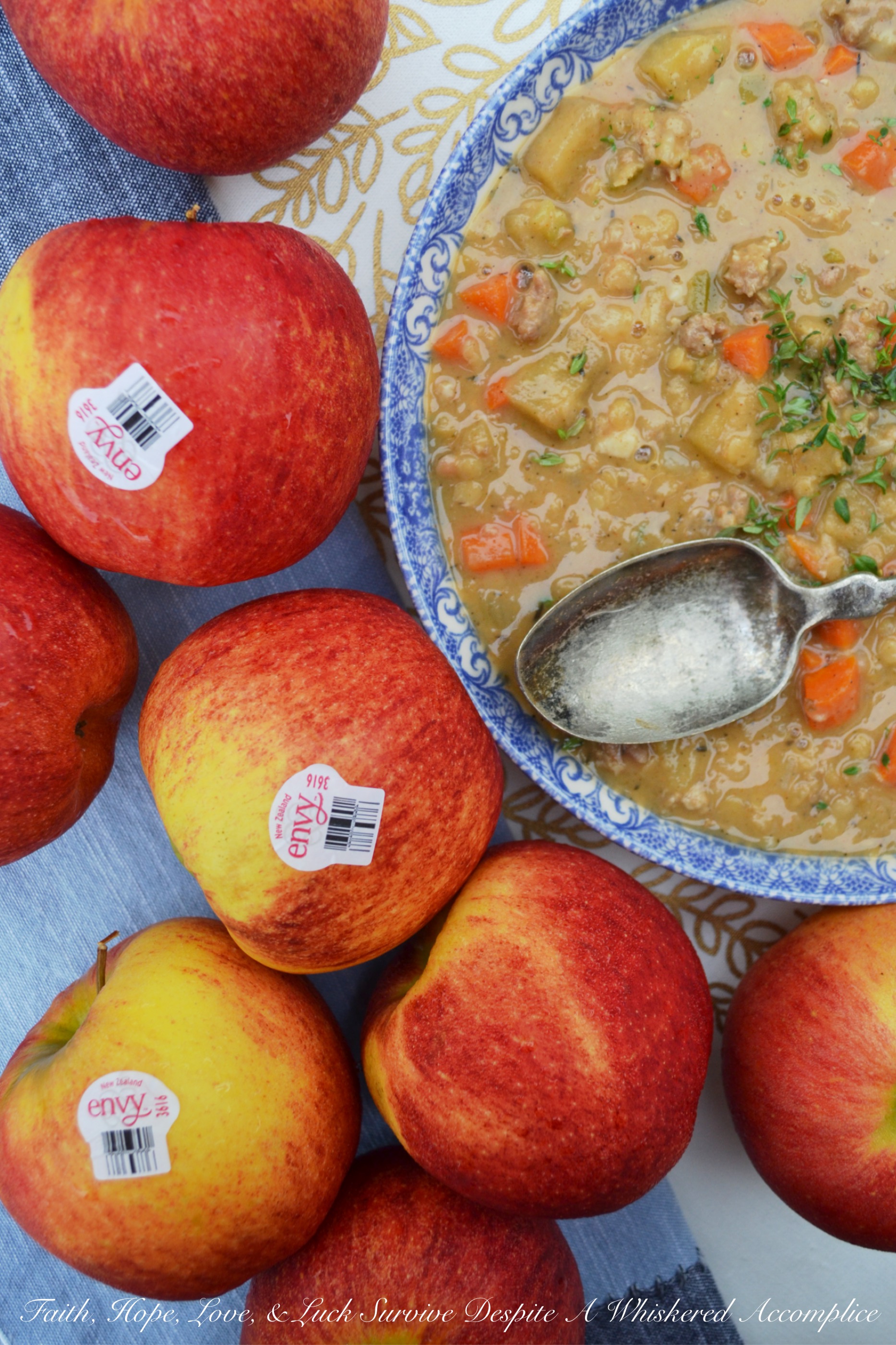 Apple & Lentil Andouille Crockpot Stew - Now that fall has finally arrived, it's time to enjoy a comforting bowl of crockpot stew. This slightly spicy apple and andouille sausage stew is packed with flavor and has a lovely texture thanks to the red split lentils it contains. I can pretty much guarantee that this is definitely one slow-cooked meal you'll be thrilled to arrive home to on a crisp autumn evening.