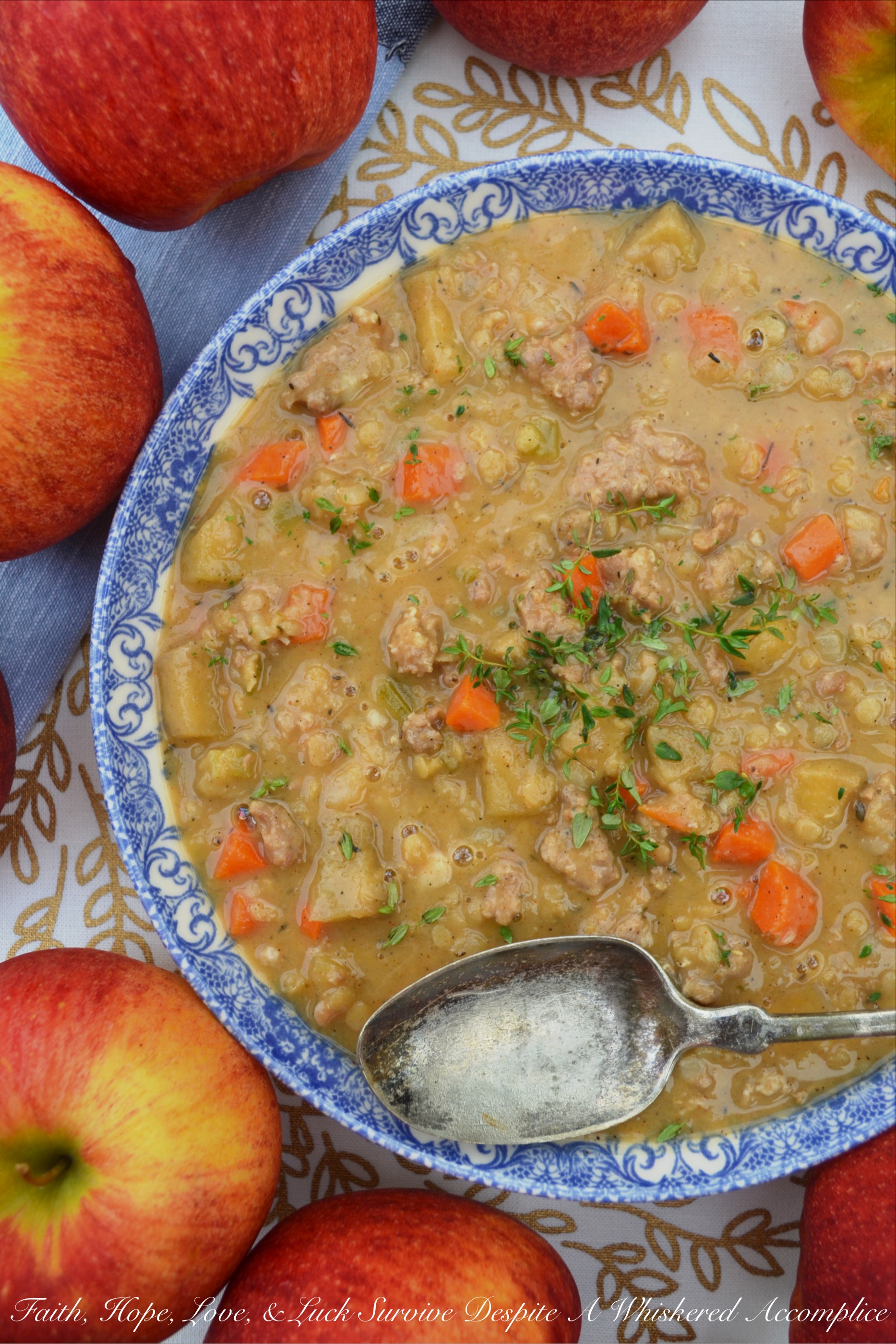 Apple & Lentil Andouille Crockpot Stew - Now that fall has finally arrived, it's time to enjoy a comforting bowl of crockpot stew. This slightly spicy apple and andouille sausage stew is packed with flavor and has a lovely texture thanks to the red split lentils it contains. I can pretty much guarantee that this is definitely one slow-cooked meal you'll be thrilled to arrive home to on a crisp autumn evening.