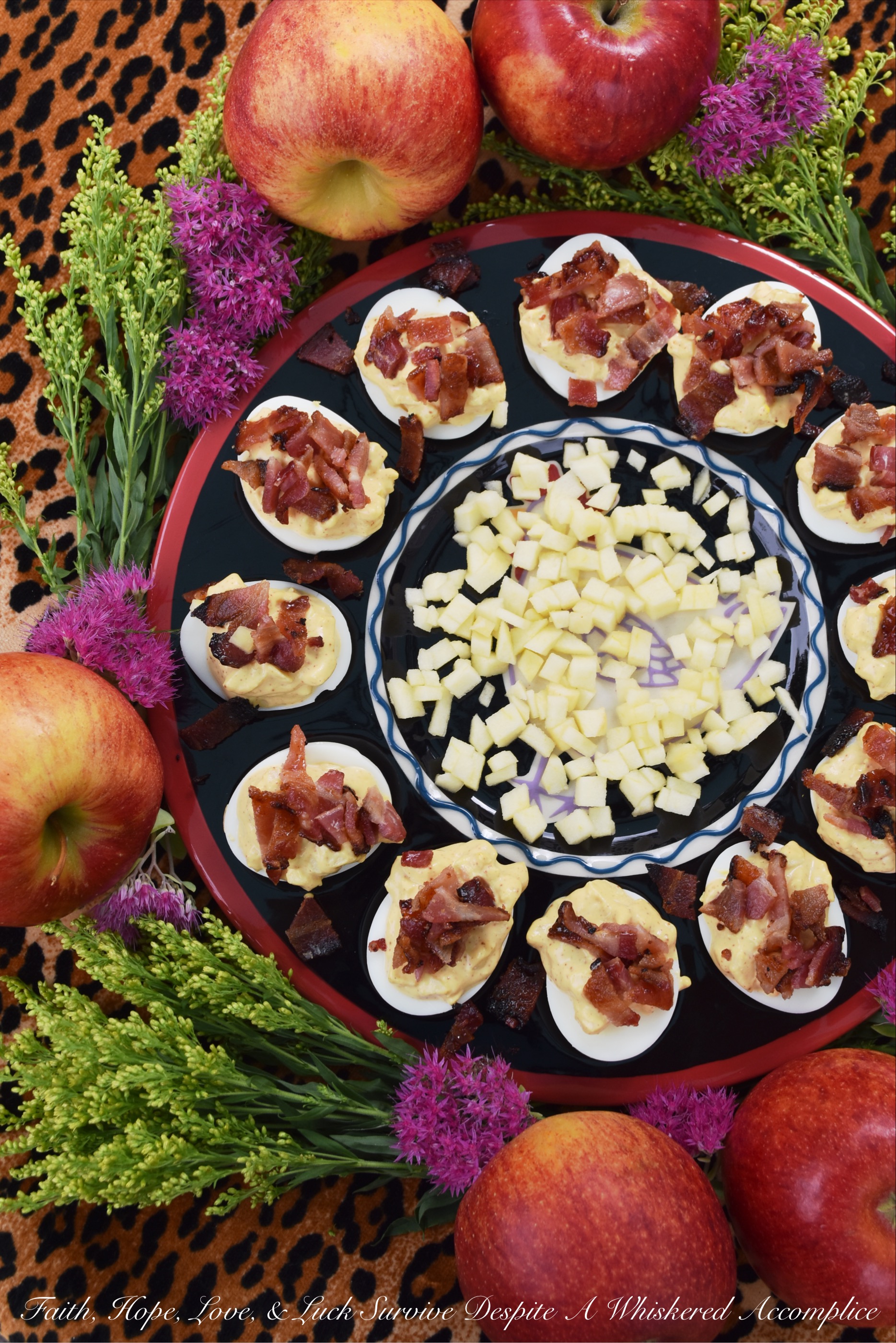 Apple & Chipotle Candied Bacon Deviled Eggs - Apples and deviled eggs certainly aren't an everyday combination, however, in this fall apple appetizer recipe, they truly do work deliciously well with one another. Perhaps it's the chipotle candied bacon which helps bring them together for the perfect marriage. I'm not sure. All I know is that once I start eating them, I seriously can't stop.