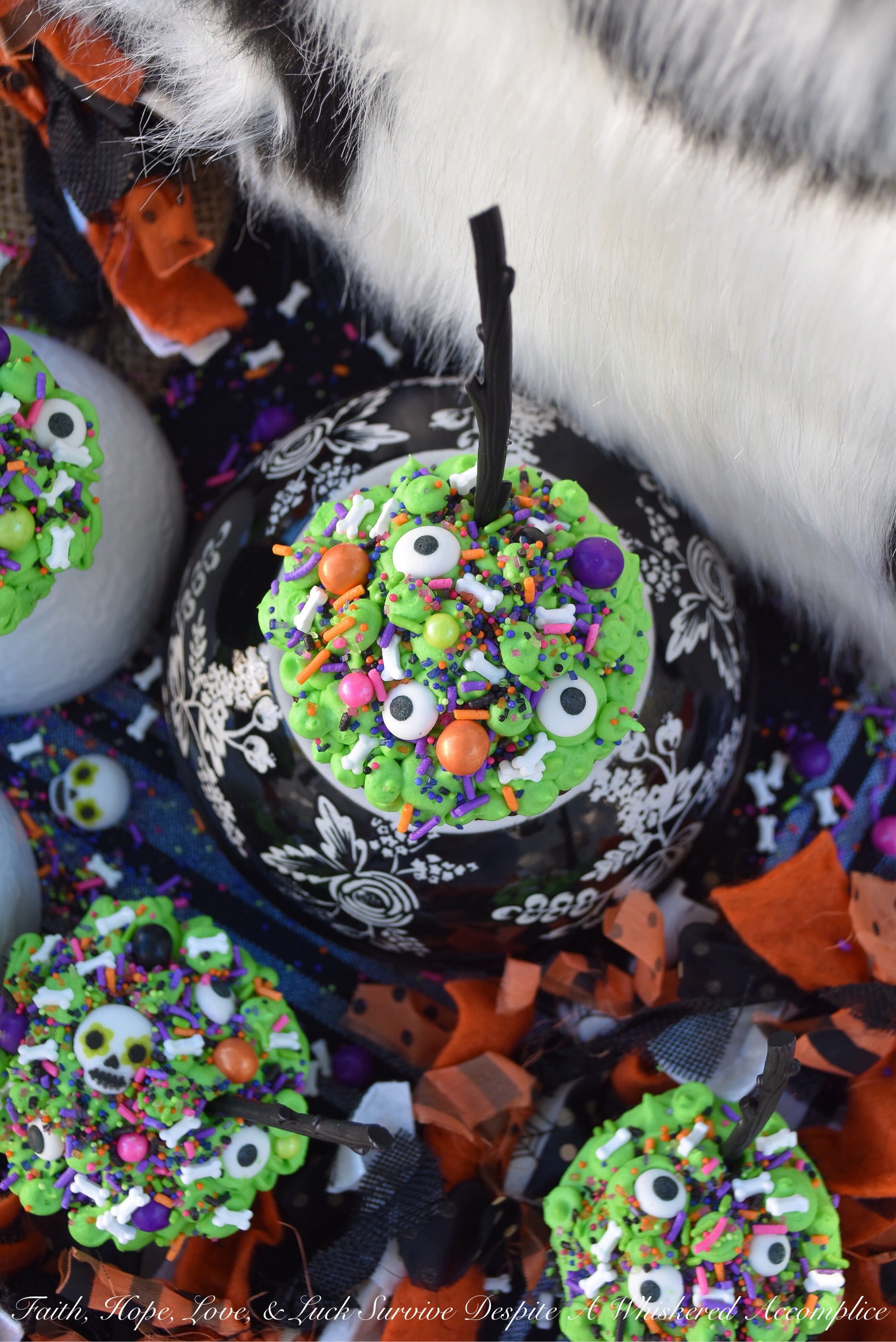 Halloween Sprinkle Cauldron Cupcakes - What can make Halloween any better than it already is? Sprinkles, of course. Especially when they're loaded on top of chocolate cupcakes with cream cheese frosting. These are the type of Halloween cauldrons your kids will definitely go crazy for, and they'll also help you clean out that sprinkle drawer or cabinet that's beginning to get a bit out of hand.