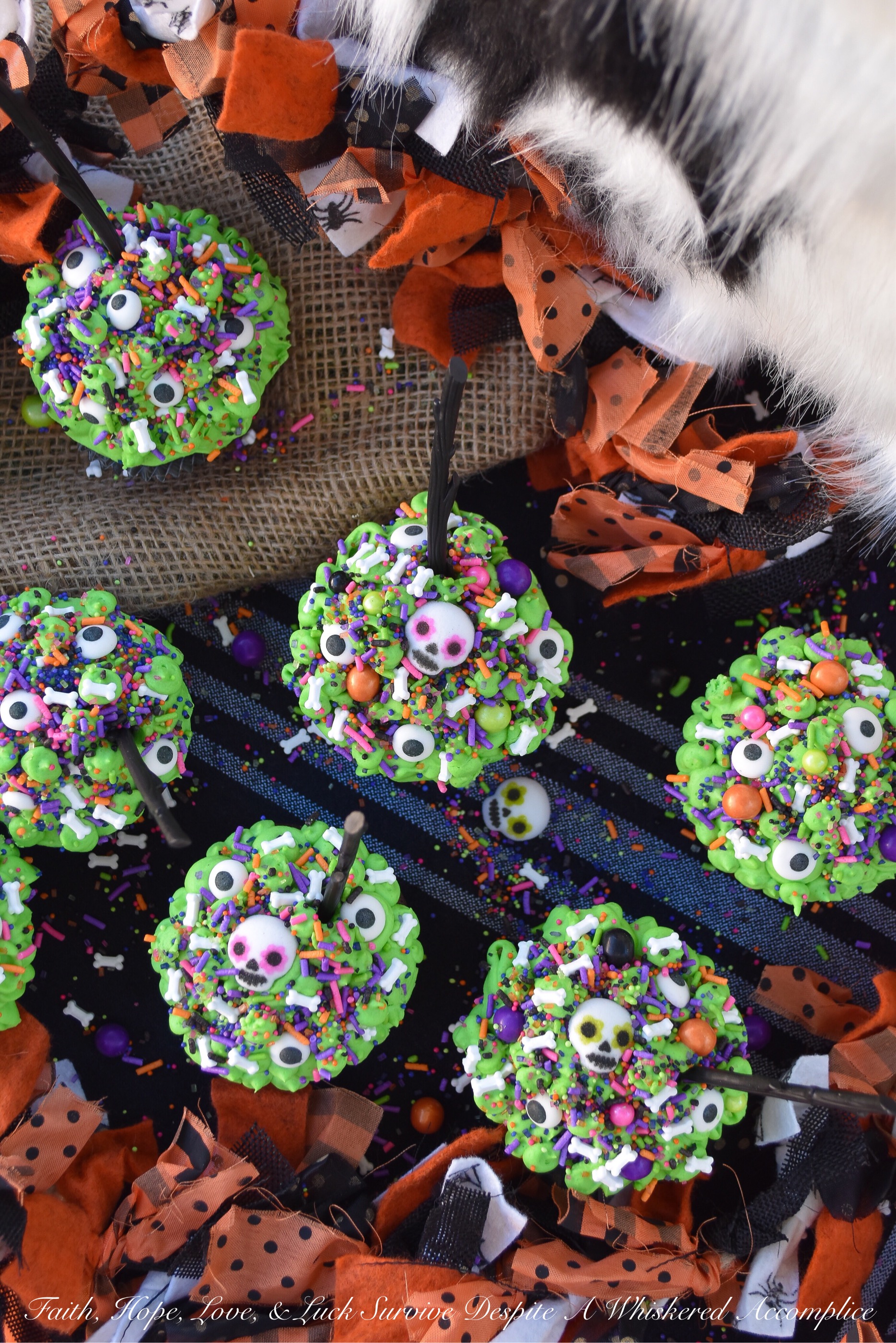 Halloween Sprinkle Cauldron Cupcakes - What can make Halloween any better than it already is? Sprinkles, of course. Especially when they're loaded on top of chocolate cupcakes with cream cheese frosting. These are the type of Halloween cauldrons your kids will definitely go crazy for, and they'll also help you clean out that sprinkle drawer or cabinet that's beginning to get a bit out of hand.