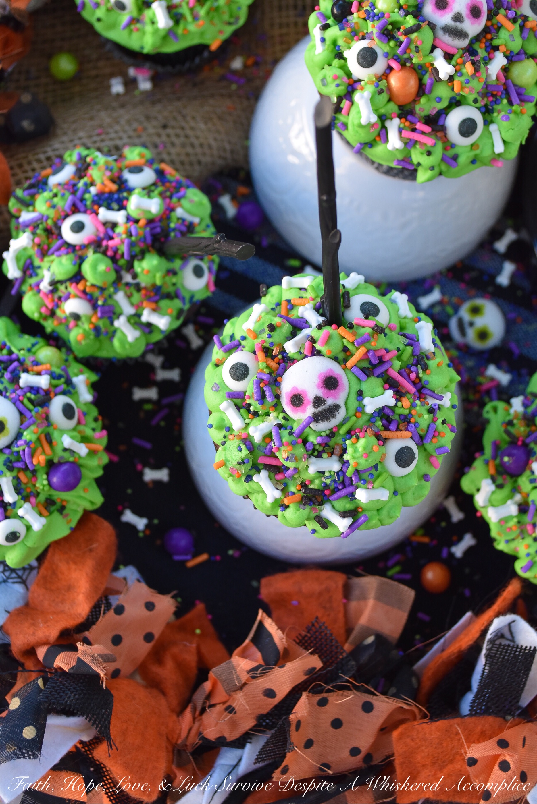Halloween Sprinkle Cauldron Cupcakes - What can make Halloween any better than it already is? Sprinkles, of course. Especially when they're loaded on top of chocolate cupcakes with cream cheese frosting. These are the type of Halloween cauldrons your kids will definitely go crazy for, and they'll also help you clean out that sprinkle drawer or cabinet that's beginning to get a bit out of hand.