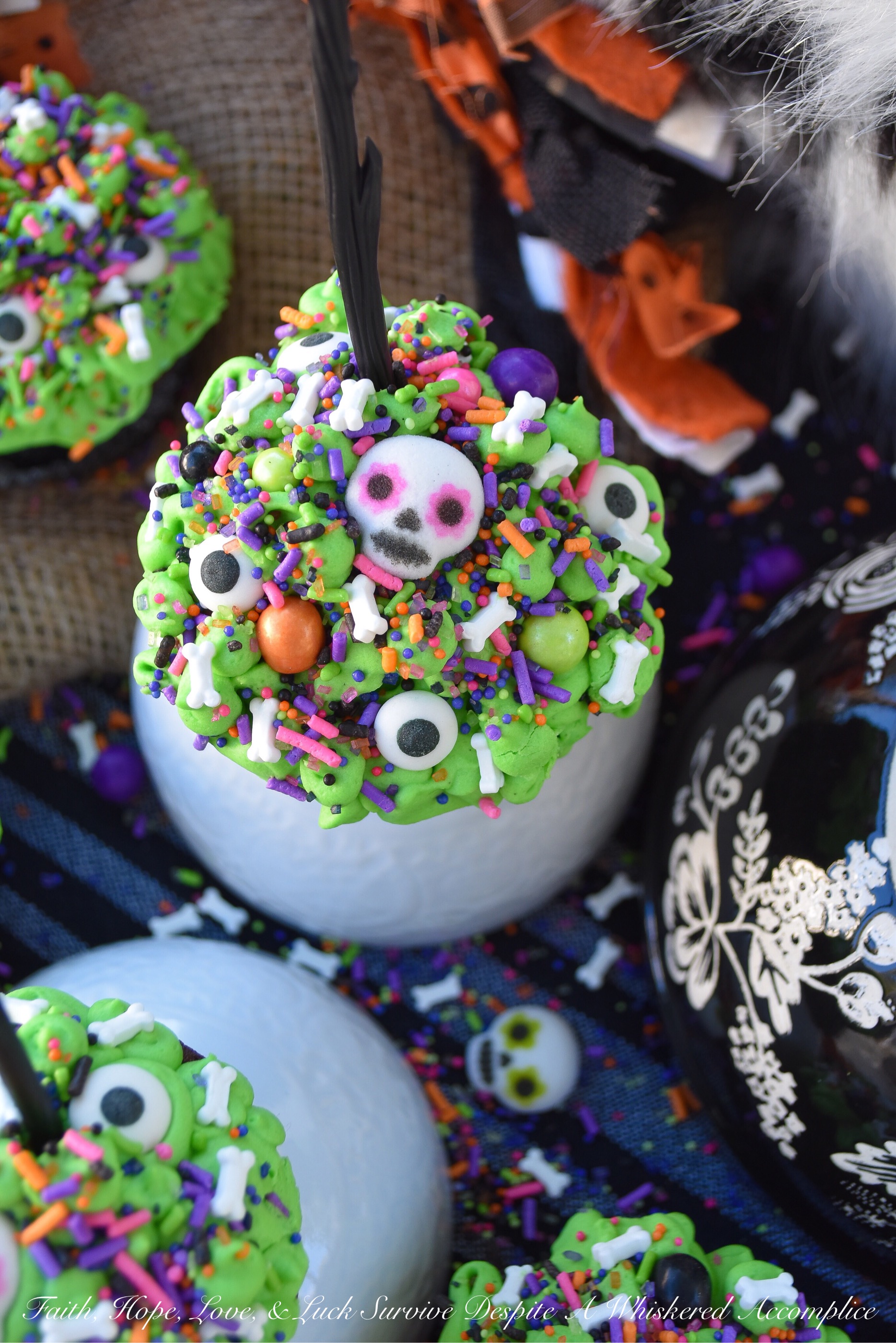 Halloween Sprinkle Cauldron Cupcakes - What can make Halloween any better than it already is? Sprinkles, of course. Especially when they're loaded on top of chocolate cupcakes with cream cheese frosting. These are the type of Halloween cauldrons your kids will definitely go crazy for, and they'll also help you clean out that sprinkle drawer or cabinet that's beginning to get a bit out of hand.