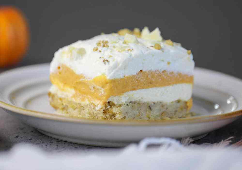 Pumpkin Lasagna Dessert - The Baking ChocolaTess - Now that the scent of apples, cinnamon, and pumpkin are in the air, it's time to start thinking about what dishes will grace our Thanksgiving day tables. This November, why not try out a few of our favorite and most-requested holiday dishes? Whether you're looking for a special breakfast, side, main, or dessert recipe, I'm pretty sure we've got a recipe both you and your family will absolutely love.